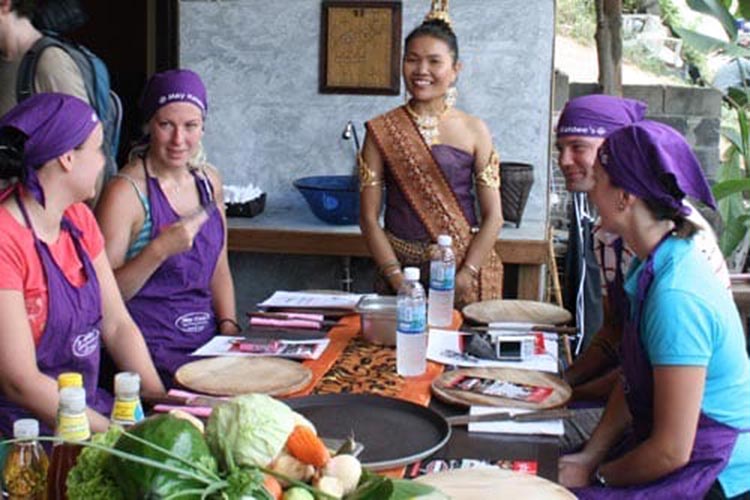 Students with May Kaidee founder giving class introduction